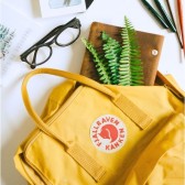 英淘节！Fjallraven Kanken 北极狐明艳黄色双肩包 £55.25（约513元）